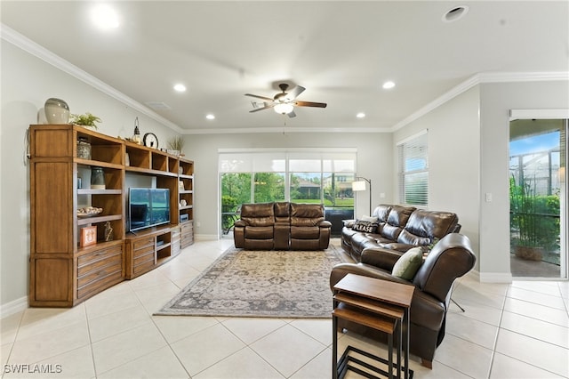 6899 Del Mar Ter, Naples, FL 34105 - living room with ceiling fan, light tile patterned floors, recessed lighting, plenty of natural light, and crown molding