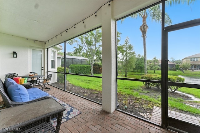 6899 Del Mar Ter, Naples, FL 34105 - sunroom featuring healthy amount of natural light