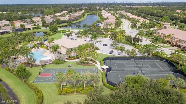6899 Del Mar Ter, Naples, FL 34105 - aerial perspective of suburban area featuring a large body of water and a pool
