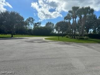 6899 Del Mar Ter, Naples, FL 34105 - view of asphalt street with curbs