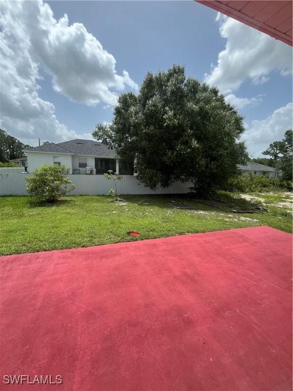 312 Lenz Ave S, Lehigh Acres, FL 33974 - view of yard featuring a patio area