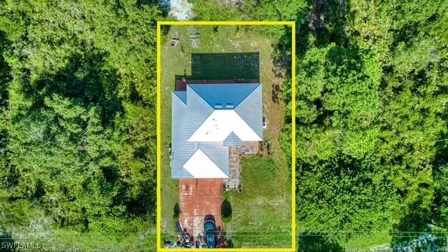 312 Lenz Ave S, Lehigh Acres, FL 33974 - view from above of property with property parcel outlined