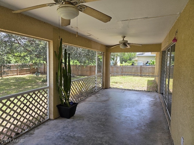 3022 34th St SW, Lehigh Acres, FL 33976 - unfurnished sunroom with a ceiling fan