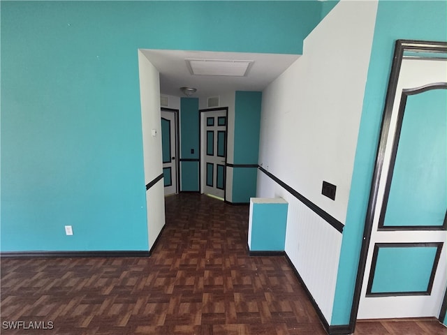 3022 34th St SW, Lehigh Acres, FL 33976 - hallway featuring baseboards