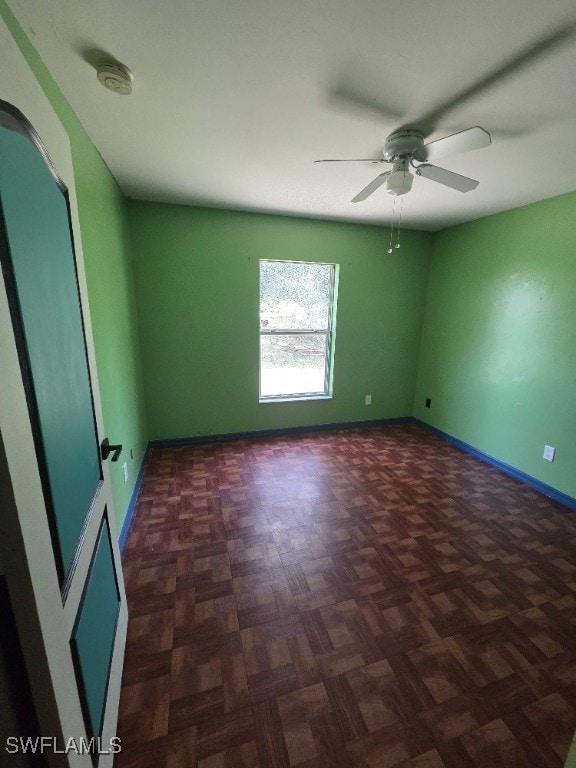 3022 34th St SW, Lehigh Acres, FL 33976 - unfurnished room featuring a ceiling fan and a smoke detector