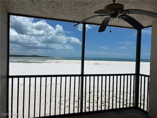 8350 Estero Blvd Unit 235, Fort Myers Beach, FL 33931 - deck with ceiling fan and view of water and beach