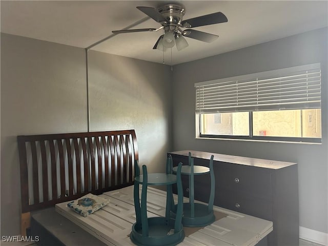 8350 Estero Blvd Unit 235, Fort Myers Beach, FL 33931 - bedroom with baseboards and a ceiling fan