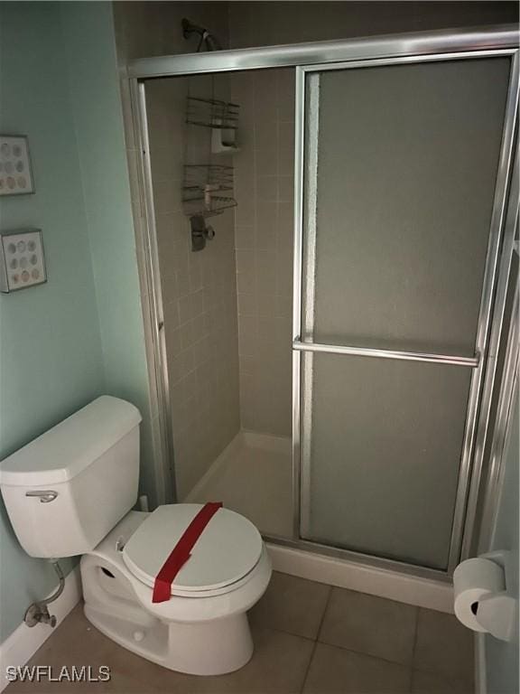 8350 Estero Blvd Unit 235, Fort Myers Beach, FL 33931 - full bath featuring tile patterned flooring and a shower stall