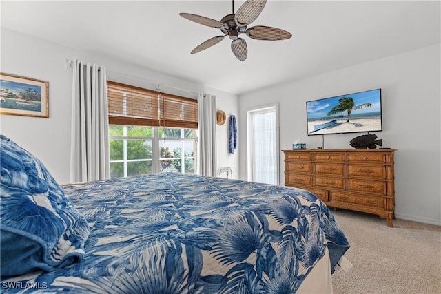 1057 Silverstrand Dr, Naples, FL 34110 - bedroom featuring carpet and ceiling fan
