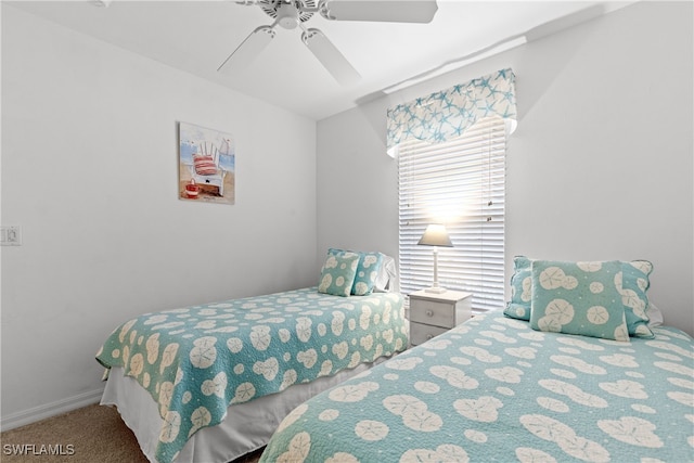 1057 Silverstrand Dr, Naples, FL 34110 - carpeted bedroom featuring a ceiling fan