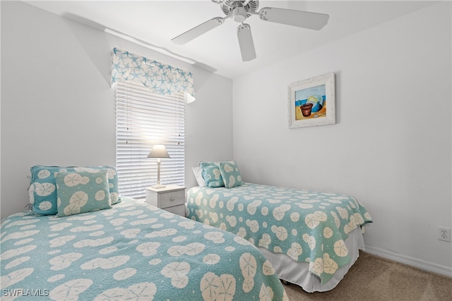 1057 Silverstrand Dr, Naples, FL 34110 - bedroom with carpet floors and a ceiling fan