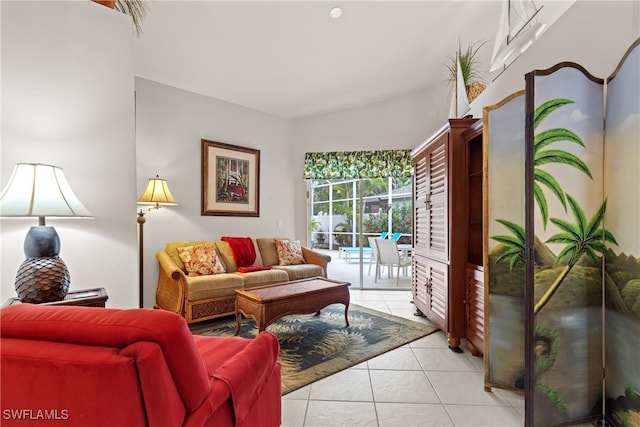1057 Silverstrand Dr, Naples, FL 34110 - living room featuring light tile patterned flooring