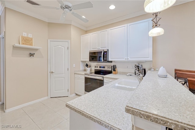 4776 Fairloop Run, Lehigh Acres, FL 33973 - kitchen featuring appliances with stainless steel finishes, a peninsula, light countertops, white cabinets, and a ceiling fan