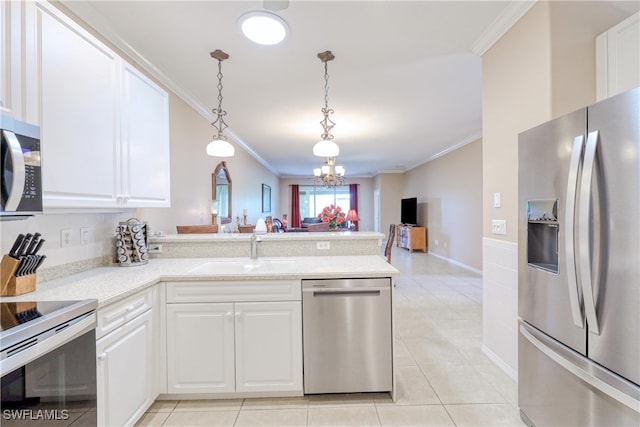 4776 Fairloop Run, Lehigh Acres, FL 33973 - kitchen with stainless steel appliances, a peninsula, crown molding, a chandelier, and light tile patterned floors