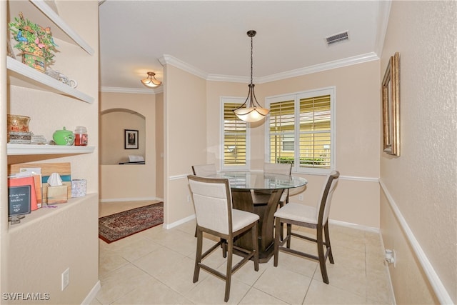 4776 Fairloop Run, Lehigh Acres, FL 33973 - dining area featuring crown molding and light tile patterned floors