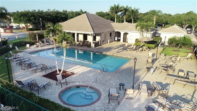 4776 Fairloop Run, Lehigh Acres, FL 33973 - community pool with a community hot tub and a patio