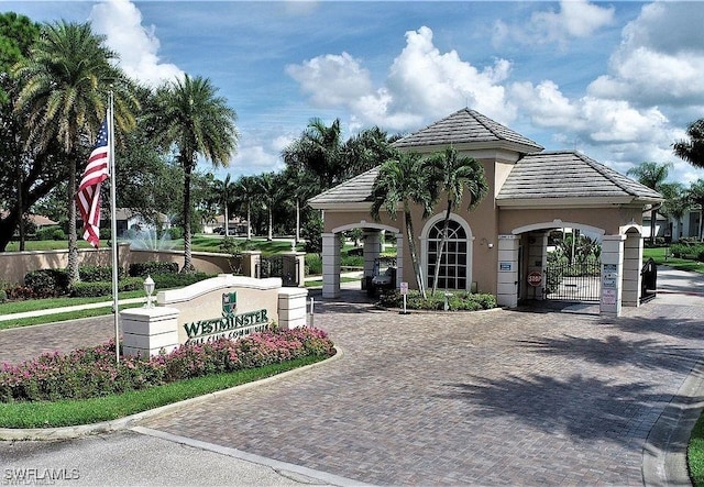 4776 Fairloop Run, Lehigh Acres, FL 33973 - view of community featuring a gate