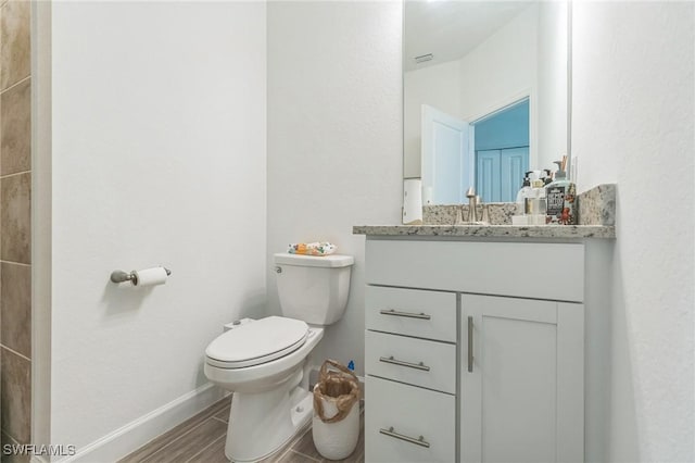 1801 Hagen Ct, Naples, FL 34120 - bathroom featuring vanity and wood finished floors