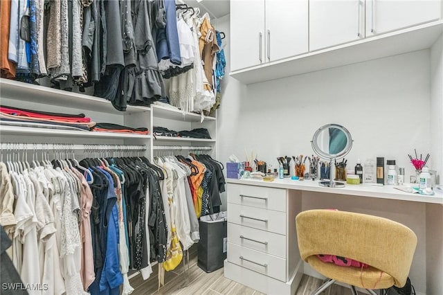 1801 Hagen Ct, Naples, FL 34120 - walk in closet with wood finished floors