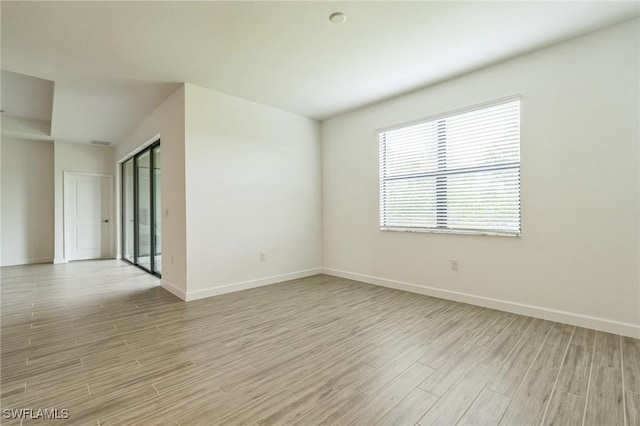 1801 Hagen Ct, Naples, FL 34120 - unfurnished room with light wood-style flooring