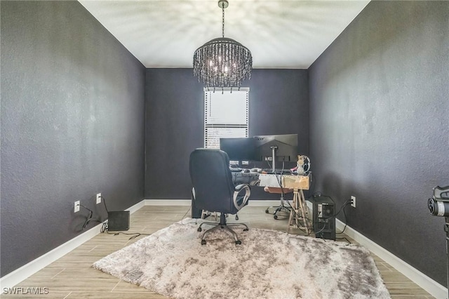 1801 Hagen Ct, Naples, FL 34120 - office featuring a chandelier and wood finished floors
