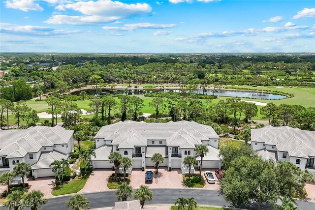 23751 Merano Ct Unit 201, Estero, FL 34134 - aerial view of residential area featuring a nearby body of water and a local golf course