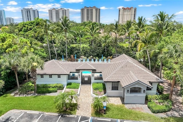 23751 Merano Ct Unit 201, Estero, FL 34134 - view from above of property featuring a tree filled landscape