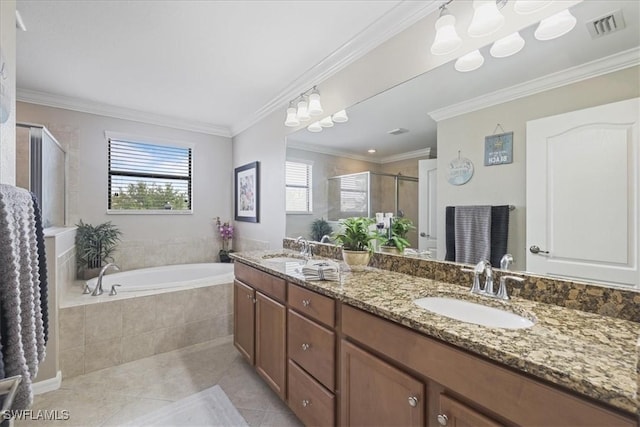20333 Cypress Shadows Blvd, Estero, FL 33928 - full bath with double vanity, a stall shower, tile patterned floors, a garden tub, and crown molding