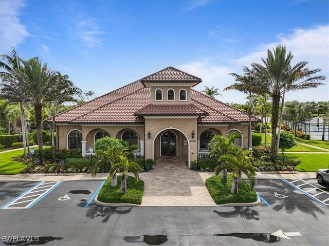 20333 Cypress Shadows Blvd, Estero, FL 33928 - view of property featuring uncovered parking
