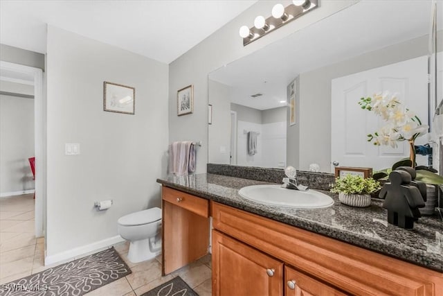 13010 Positano Cir Unit 206, Naples, FL 34105 - bathroom with tile patterned floors and vanity