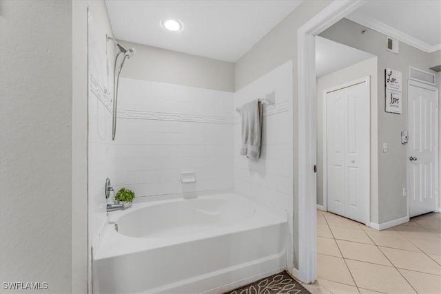 13010 Positano Cir Unit 206, Naples, FL 34105 - bathroom featuring tile patterned flooring, ornamental molding, and washtub / shower combination
