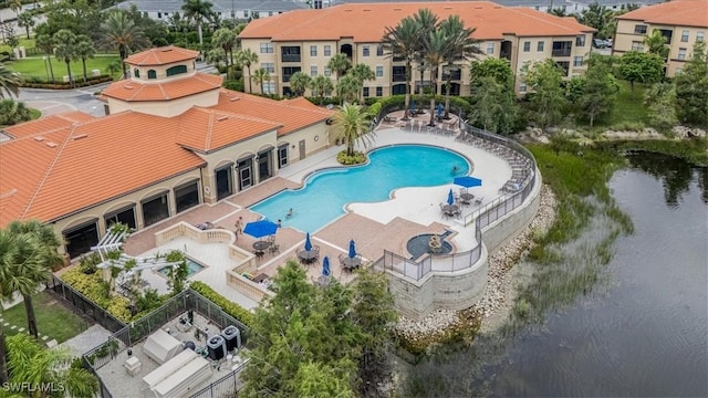 13010 Positano Cir Unit 206, Naples, FL 34105 - community pool featuring a patio