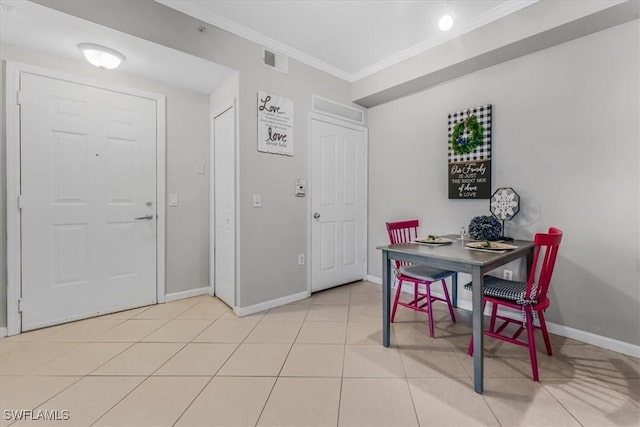 13010 Positano Cir Unit 206, Naples, FL 34105 - dining room featuring crown molding and light tile patterned flooring