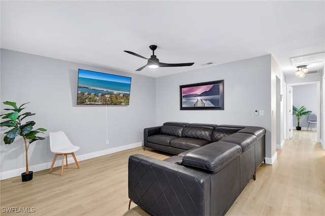 610 SW 47th Ter Unit 2, Cape Coral, FL 33914 - living room with light wood-style flooring and ceiling fan