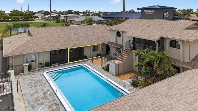 610 SW 47th Ter Unit 2, Cape Coral, FL 33914 - community pool featuring a sunroom and stairs