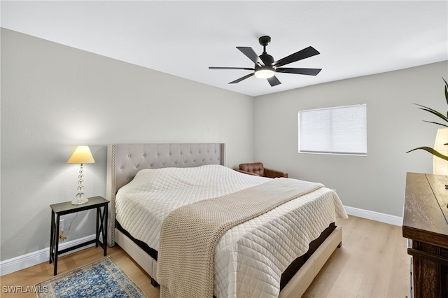 610 SW 47th Ter Unit 2, Cape Coral, FL 33914 - bedroom with wood finished floors and ceiling fan