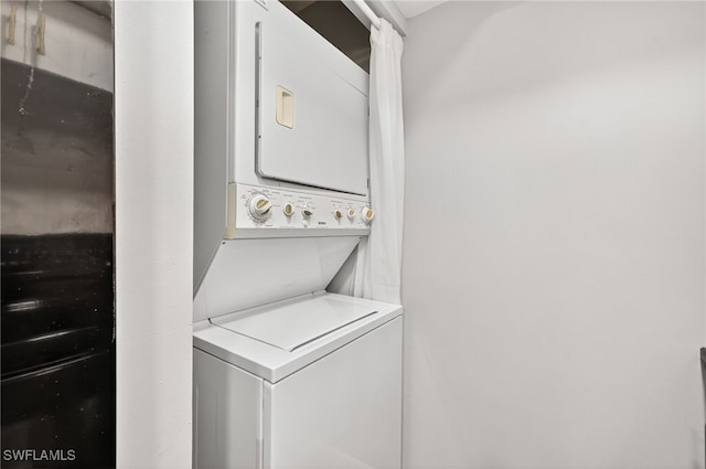 610 SW 47th Ter Unit 2, Cape Coral, FL 33914 - laundry area with stacked washing machine and dryer
