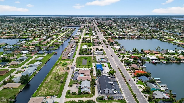 610 SW 47th Ter Unit 2, Cape Coral, FL 33914 - aerial view of property and surrounding area with nearby suburban area and a nearby body of water