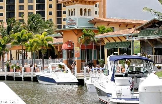 610 SW 47th Ter Unit 2, Cape Coral, FL 33914 - dock featuring a water view