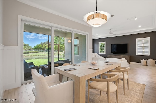 8951 Saint Lucia Dr, Naples, FL 34114 - dining area featuring crown molding and a wainscoted wall