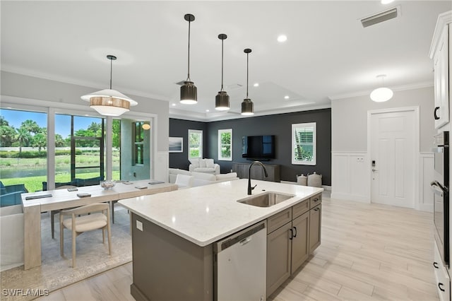 8951 Saint Lucia Dr, Naples, FL 34114 - kitchen featuring stainless steel dishwasher, crown molding, decorative light fixtures, open floor plan, and an island with sink