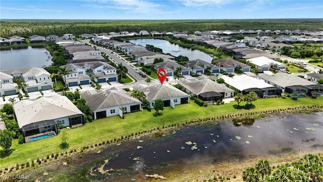 8951 Saint Lucia Dr, Naples, FL 34114 - aerial perspective of suburban area with a nearby body of water