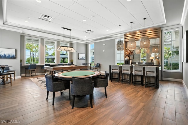 8951 Saint Lucia Dr, Naples, FL 34114 - recreation room featuring wood finished floors, recessed lighting, and crown molding