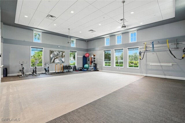 8951 Saint Lucia Dr, Naples, FL 34114 - workout area featuring carpet flooring, a high ceiling, and recessed lighting