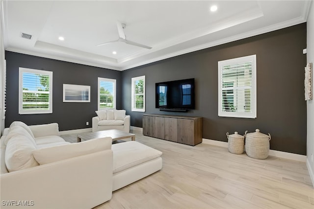 8951 Saint Lucia Dr, Naples, FL 34114 - living area featuring a tray ceiling, ornamental molding, recessed lighting, a ceiling fan, and wood finished floors