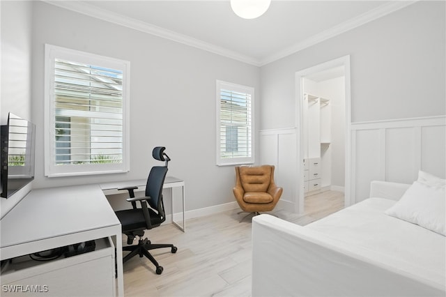 8951 Saint Lucia Dr, Naples, FL 34114 - bedroom with ornamental molding, an office area, light wood-style floors, wainscoting, and a spacious closet