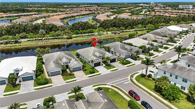 8951 Saint Lucia Dr, Naples, FL 34114 - aerial perspective of suburban area with a nearby body of water
