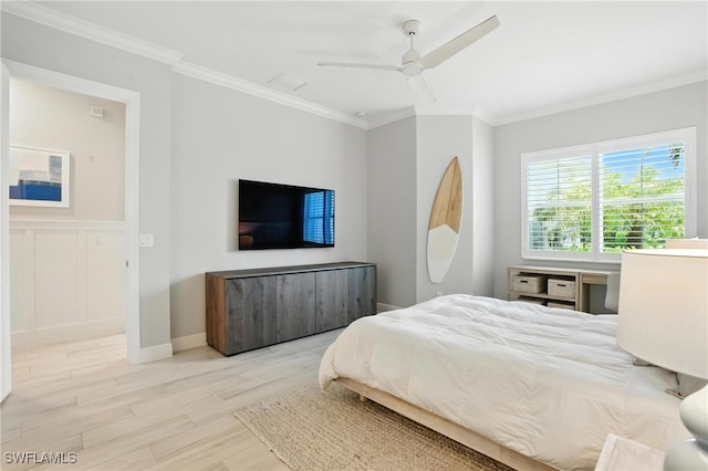 8951 Saint Lucia Dr, Naples, FL 34114 - bedroom with wood finished floors, ornamental molding, and a ceiling fan