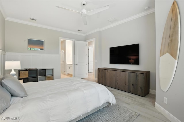 8951 Saint Lucia Dr, Naples, FL 34114 - bedroom featuring crown molding, ensuite bath, light wood-type flooring, and a ceiling fan