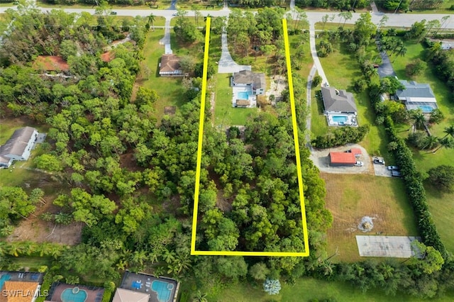 675 Logan Blvd S, Naples, FL 34119 - aerial view of property's location featuring property parcel outlined